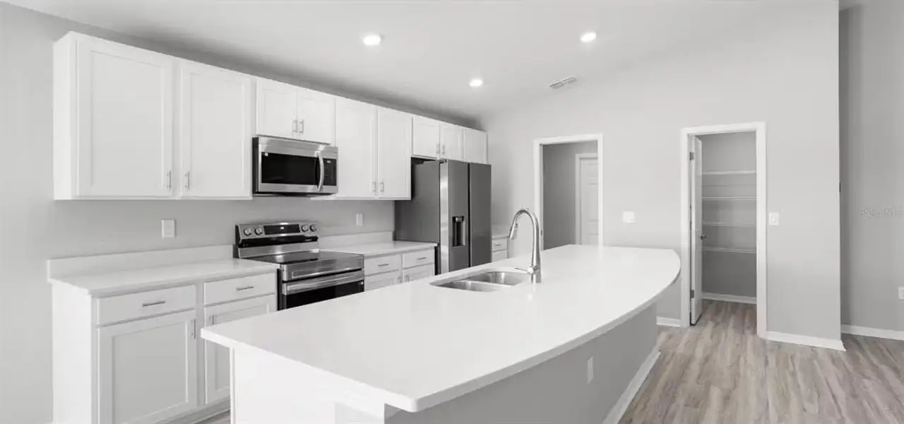 Furnished interior view inside a new home in Vista Trace, Belleview (Image 4).