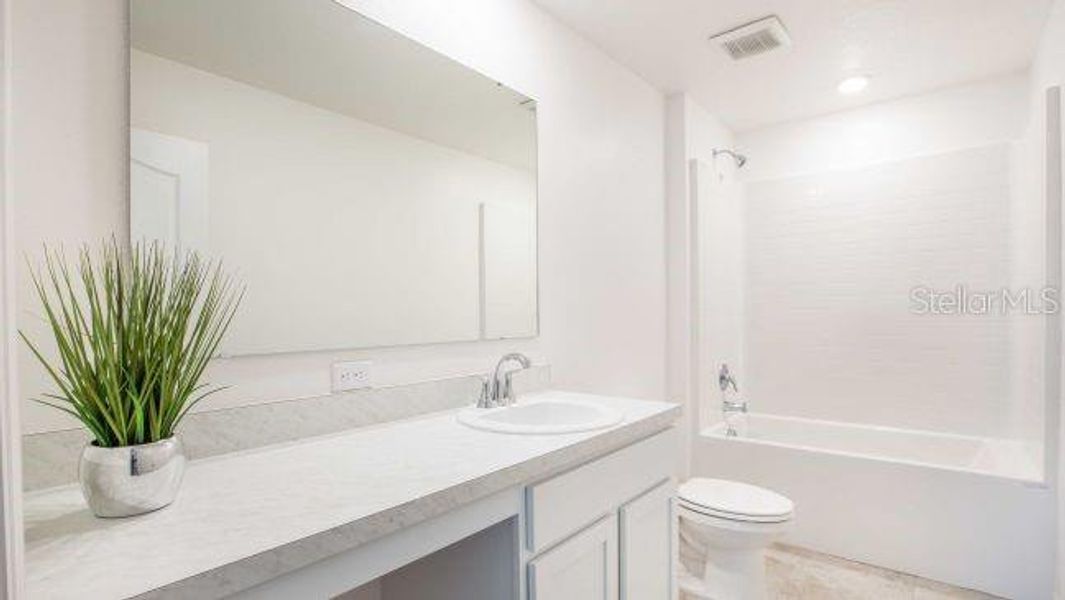 Furnished interior view inside a new home in North Port, North Port (Image 8).