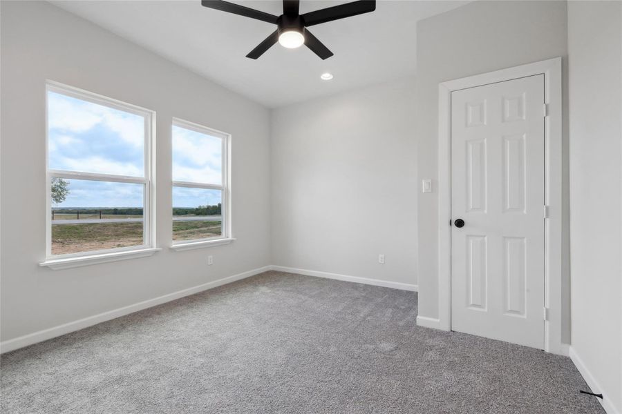 Unfurnished room with a ceiling fan, carpet, baseboards, and recessed lighting Unfurnished room with a ceiling fan, carpet, baseboards, and recessed lighting