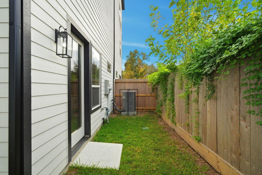 Exterior details and patio area of a home in , Houston (Image 4).
