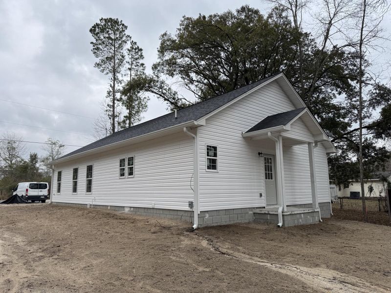 Front exterior of a new home in , Eutawville, SC, highlighting curb appeal (Image 13). Front exterior of a new home in , Eutawville, SC, highlighting curb appeal (Image 13).