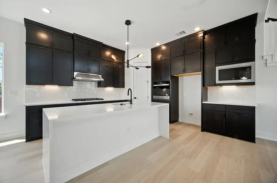 Furnished interior view inside a new home in Foxfield, Austin (Image 4). Furnished interior view inside a new home in Foxfield, Austin (Image 4).