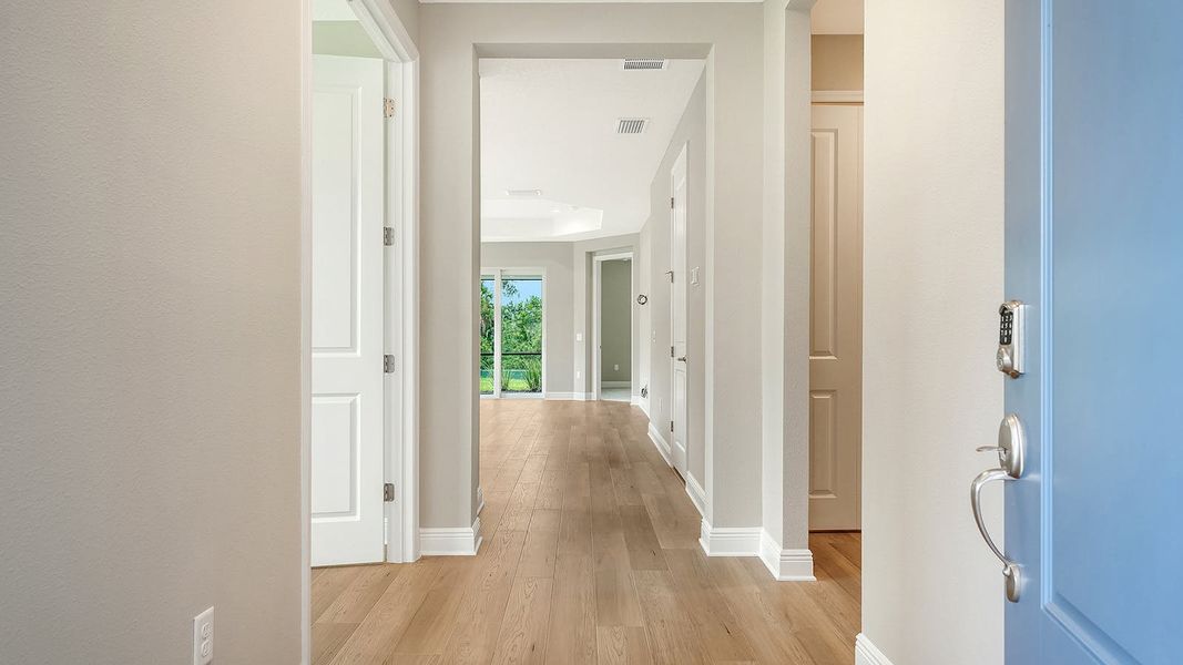 Spacious, unfurnished interior of a new home in Wildleaf Real Estate and Homes for Sale in Parrish, FL - Neal Communities, Parrish (Image 26).