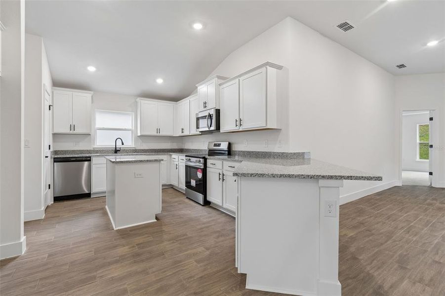 Furnished interior view inside a new home in Abbey Glen, Dade City (Image 11).