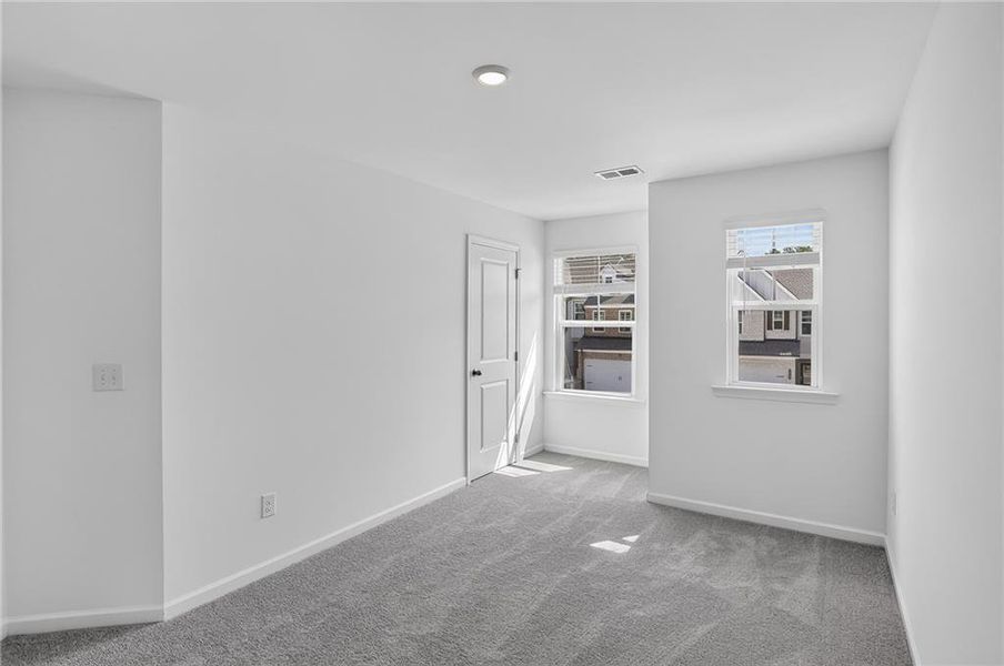 Spacious, unfurnished interior of a new home in Towns at Ivy Creek, Buford (Image 15).
