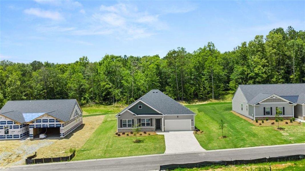 Front exterior of a new home in Kingston Ranch at Lake Oconee, Buckhead, GA, highlighting curb appeal (Image 24).