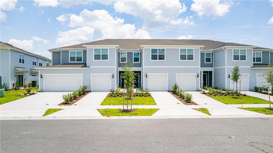 Front exterior of a new home in , Kissimmee, FL, highlighting curb appeal (Image 22). Front exterior of a new home in , Kissimmee, FL, highlighting curb appeal (Image 22).