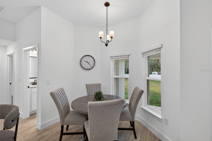 Furnished interior view inside a new home in Hill Country Estates, Dade City (Image 15).