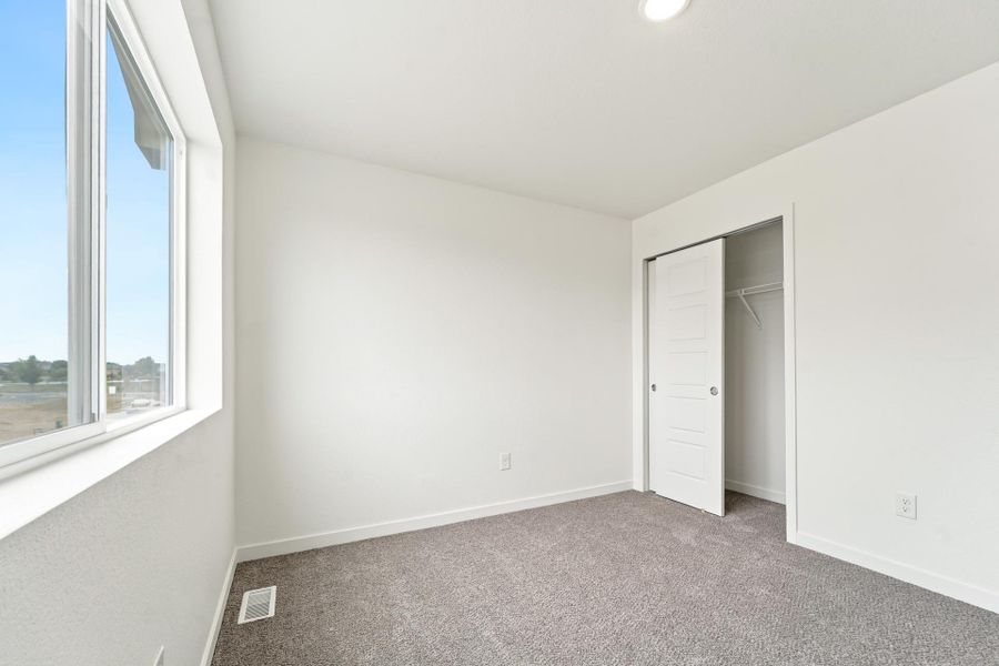 Spacious, unfurnished interior of a new home in Conestoga, Ault (Image 18). Spacious, unfurnished interior of a new home in Conestoga, Ault (Image 18).