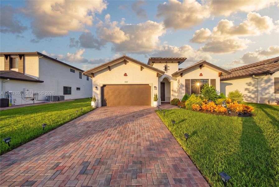 Front exterior of a new home in , Immokalee, FL, highlighting curb appeal (Image 28).