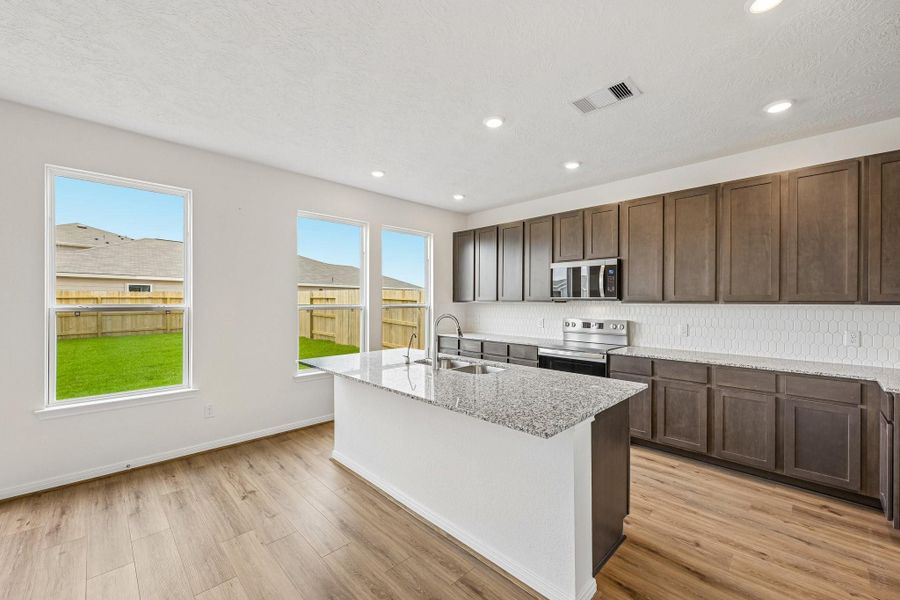Convenient breakfast bar addition, perfect for casual dining and entertaining.
