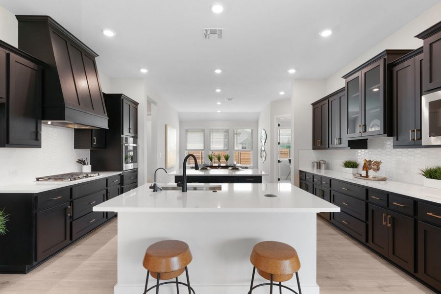 Representative furnished interior of a home built from the Samantha by Chesmar Homes in The Grove at Blackhawk, Pflugerville (Image 6). Representative furnished interior of a home built from the Samantha by Chesmar Homes in The Grove at Blackhawk, Pflugerville (Image 6).