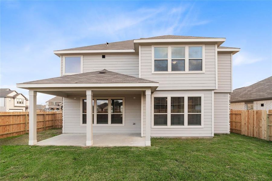 Come and see this spacious backyard with its beautiful covered patio. There is plenty of room for the kids to play and adults to relax!