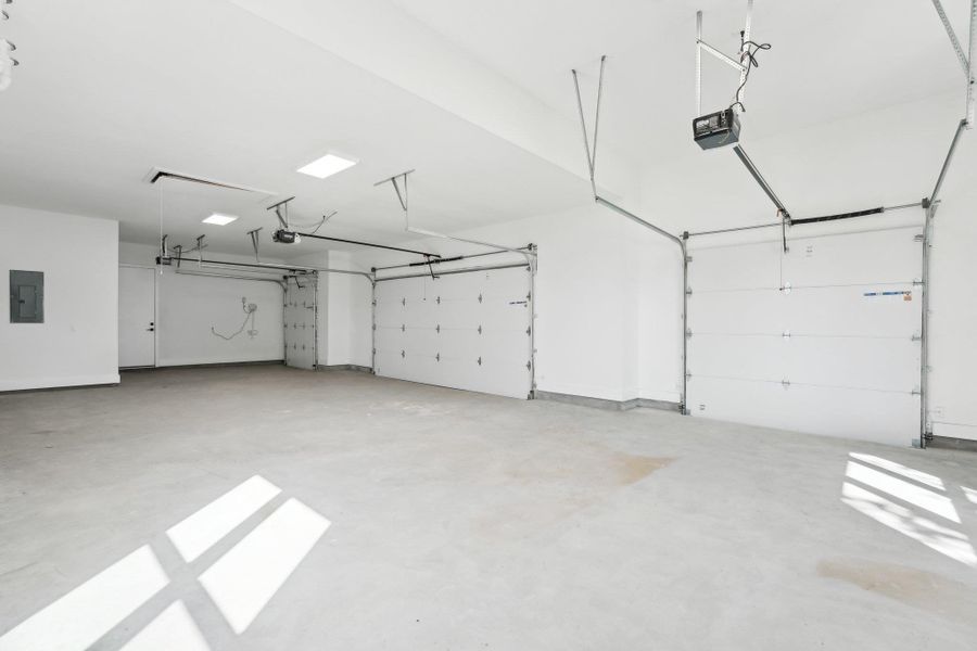 Three-car garage with room for hobbies, storage, and more. Three-car garage with room for hobbies, storage, and more.