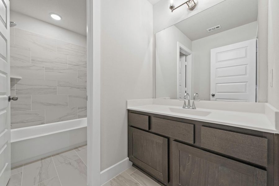 Furnished interior view inside a new home in The Trails, New Caney (Image 10).