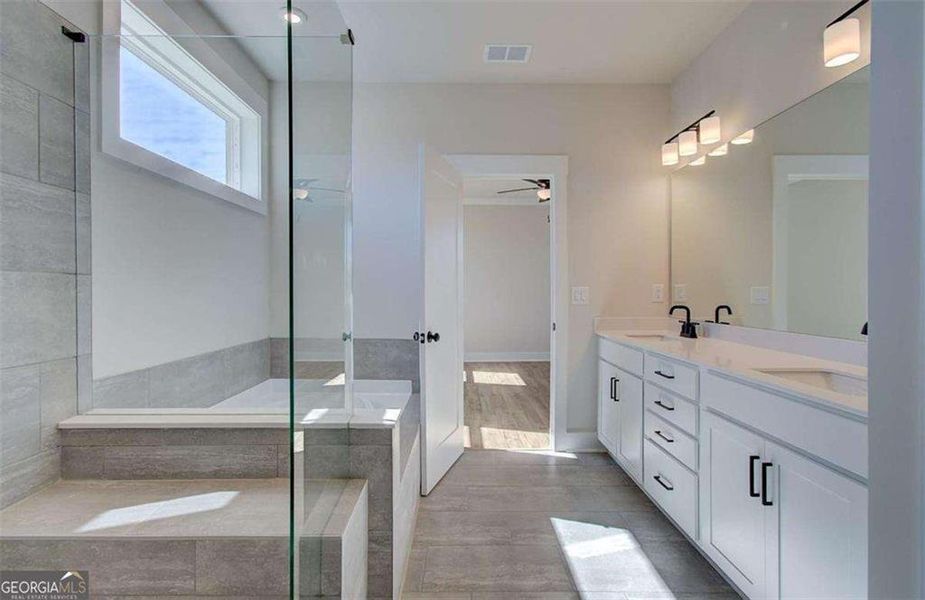Furnished interior view inside a new home in The Paddocks at Doc Hughes, Buford (Image 11).