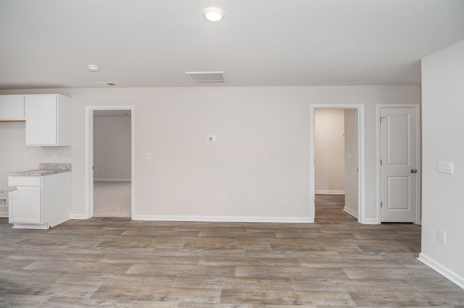Representative unfurnished interior of a home built from the LEWIS by D.R. Horton in Cottonwood Place, Tabor City (Image 8).