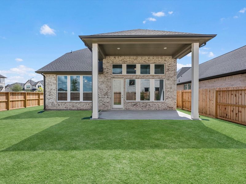 Exterior details and patio area of a home in Pecan Ridge, Fulshear (Image 3).
