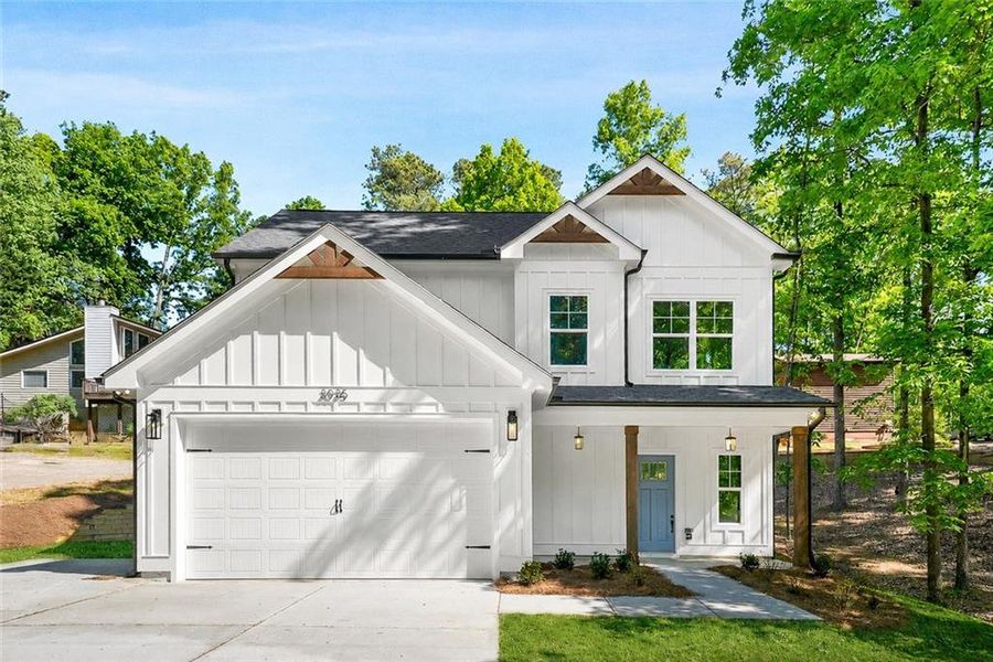 Front exterior of a new home in , Cumming, GA, highlighting curb appeal (Image 2). Front exterior of a new home in , Cumming, GA, highlighting curb appeal (Image 2).
