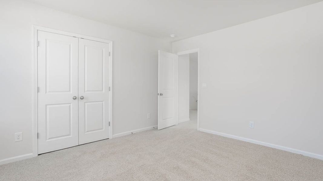 Representative unfurnished interior of a home built from the KYLE by D.R. Horton in Hudson Glen, Mocksville (Image 27).