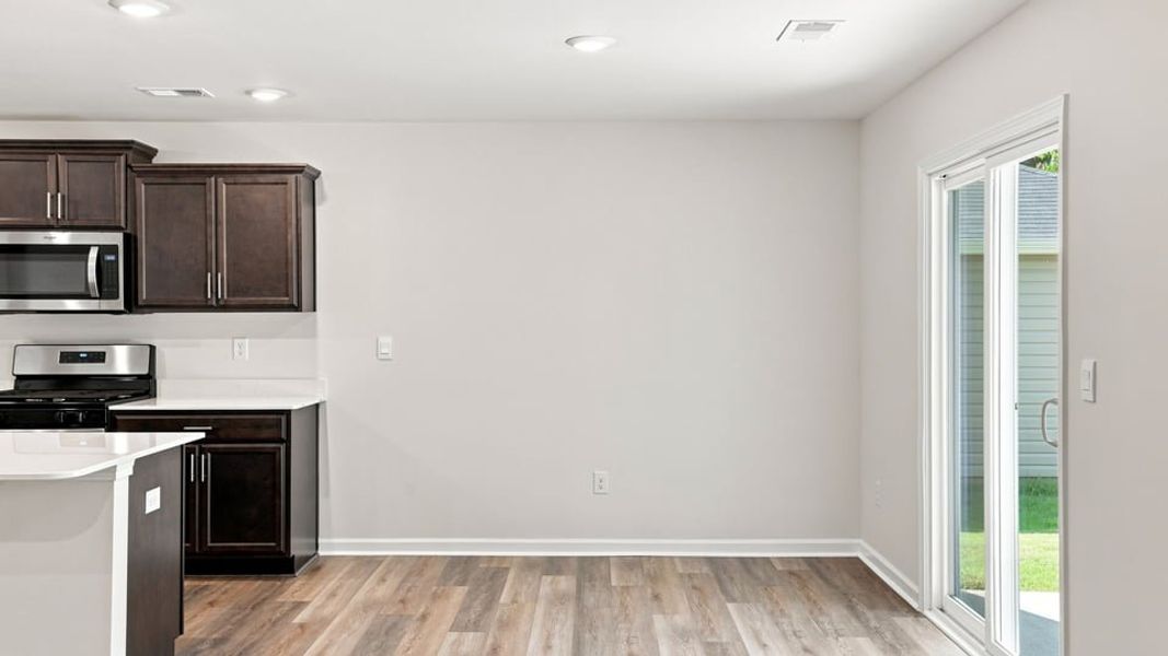 Furnished interior view inside a new home in Bentley Park, Greenwood (Image 6).