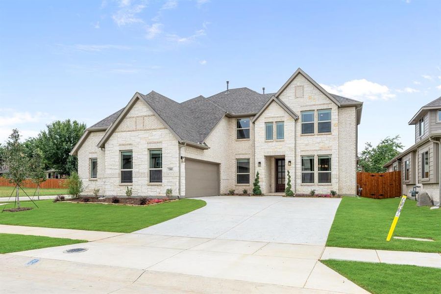 Front exterior of a new home in Glenwood Meadows, Argyle, TX, highlighting curb appeal (Image 1). Front exterior of a new home in Glenwood Meadows, Argyle, TX, highlighting curb appeal (Image 1).