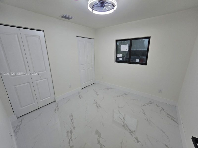 Spacious, unfurnished interior of a new home in , Lehigh Acres (Image 15).
