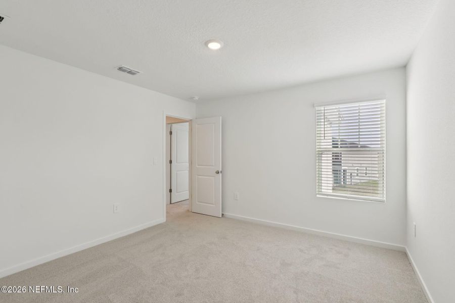 Spacious, unfurnished interior of a new home in Cypress Meadows - The Villas, Jacksonville (Image 27).