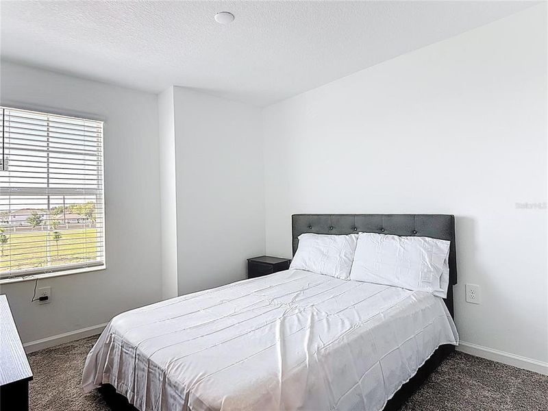 Furnished interior view inside a new home in Lawson Dunes, Haines City (Image 9).