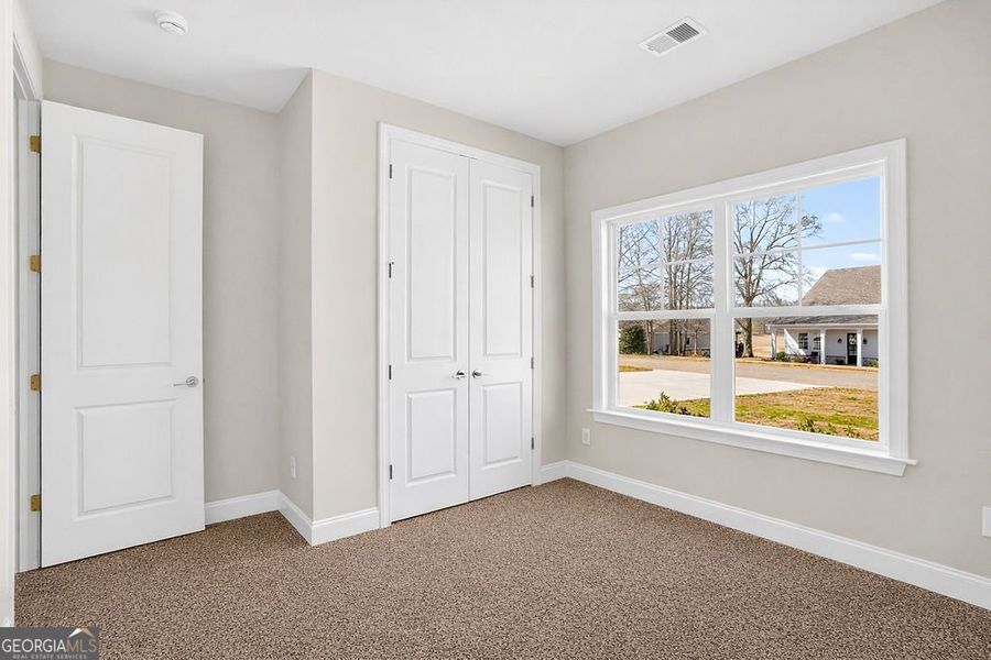 Spacious, unfurnished interior of a new home in Stone Brooke, Gray (Image 13).