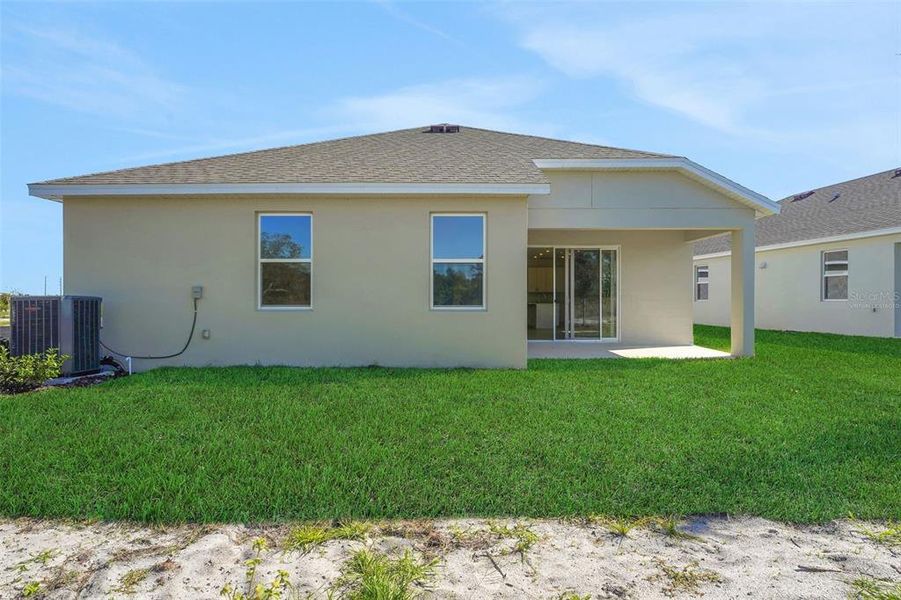 Exterior details and patio area of a home in Willowbrook North, Winter Haven (Image 3). Exterior details and patio area of a home in Willowbrook North, Winter Haven (Image 3).