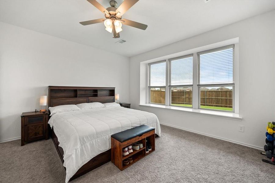 Spacious primary bedroom on the main floor.