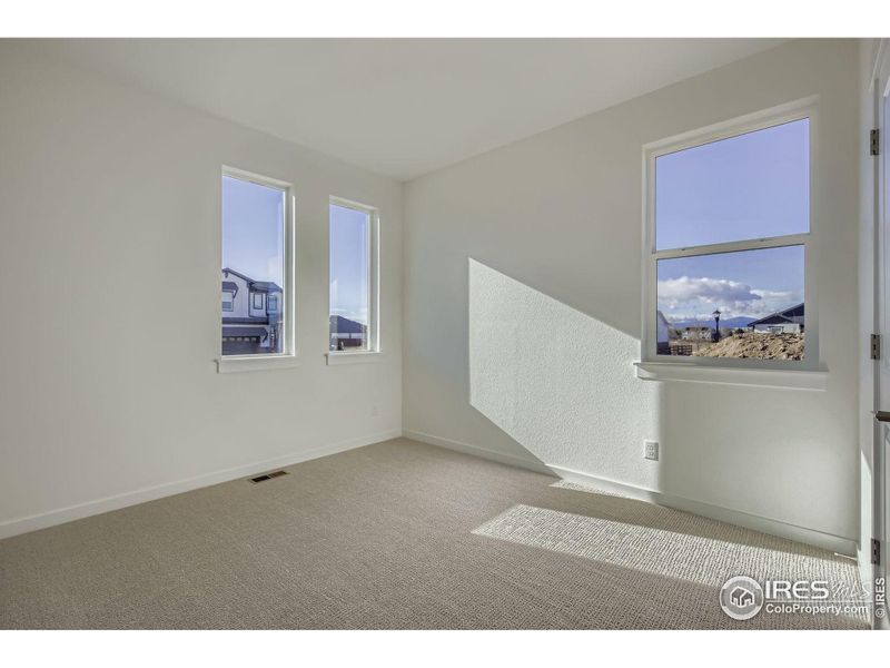 Spacious, unfurnished interior of a new home in RainDance - 60s, Windsor (Image 22).