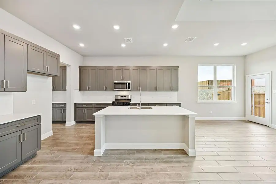 Furnished interior view inside a new home in Venetian, Weston (Image 3).
