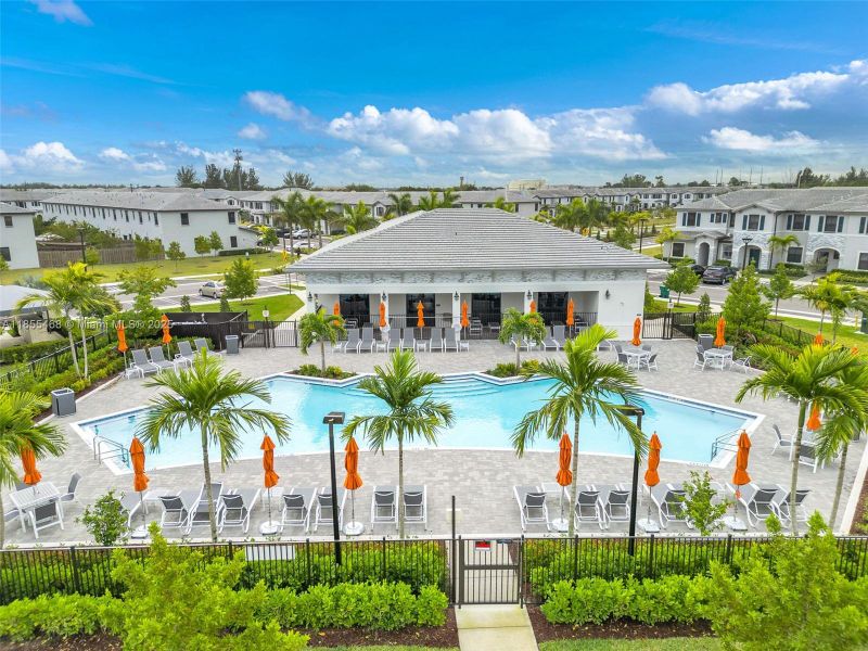 Front exterior of a new home in , Homestead, FL, highlighting curb appeal (Image 24).