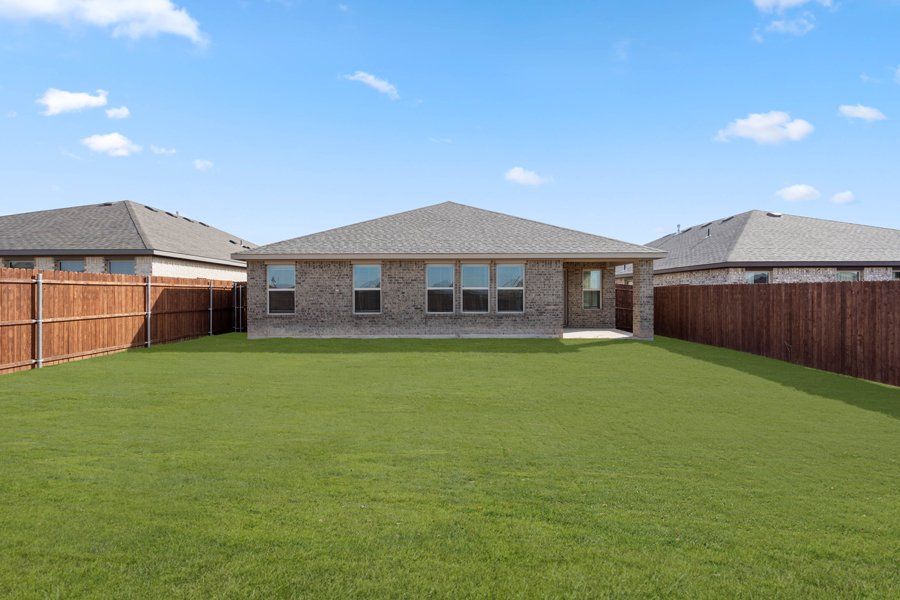 Representative exterior photo of a completed home built from the Cheyenne by Impression Homes in ValleyBrooke, Mesquite, TX (Image 25).