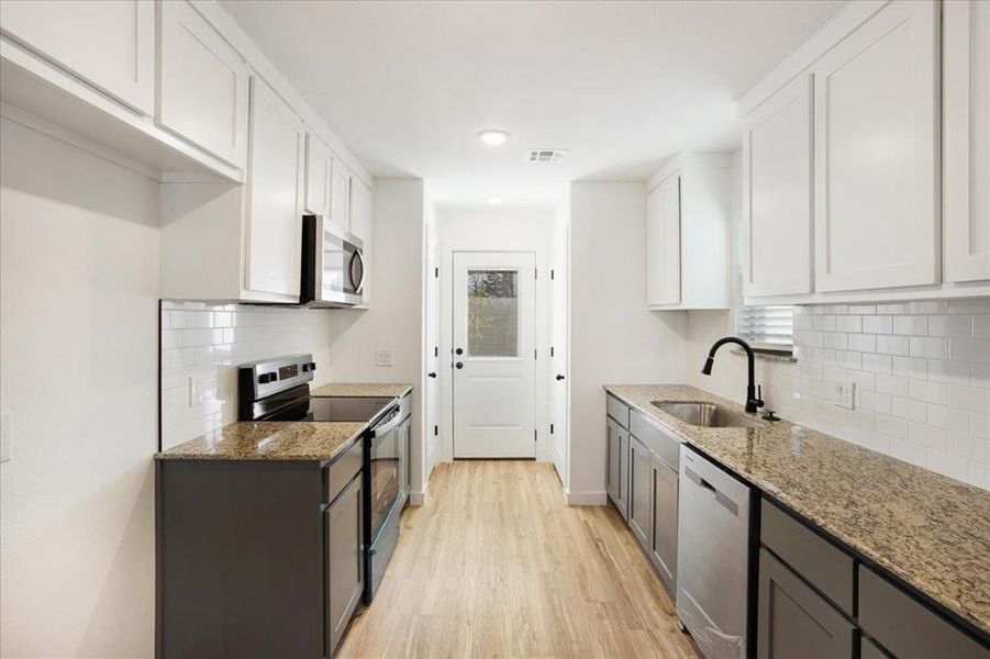Furnished interior view inside a new home in Miller Street Cottages, Denison (Image 7).