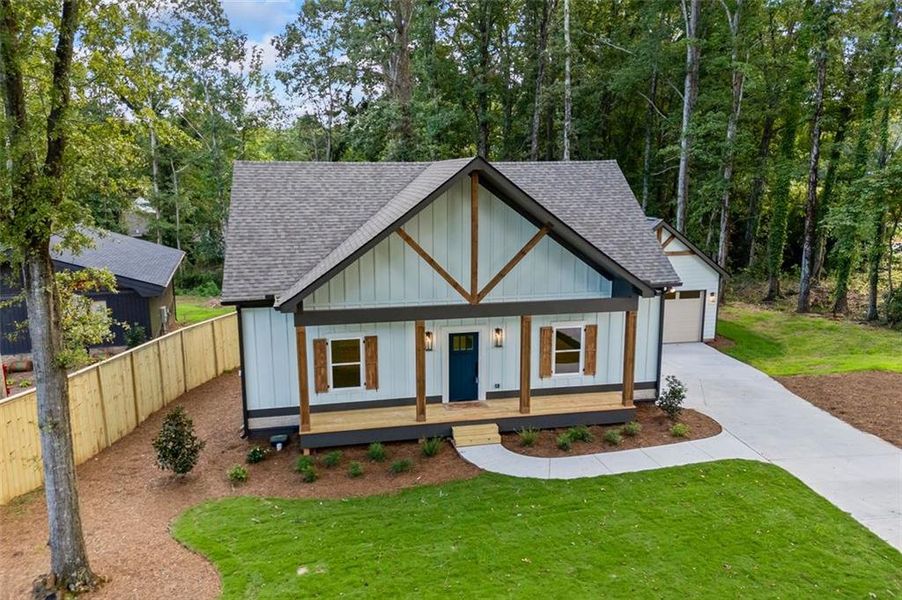 Front exterior of a new home in , Monroe, GA, highlighting curb appeal (Image 31).