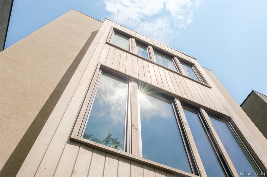 Front exterior of a new home in , Denver, CO, highlighting curb appeal (Image 1).