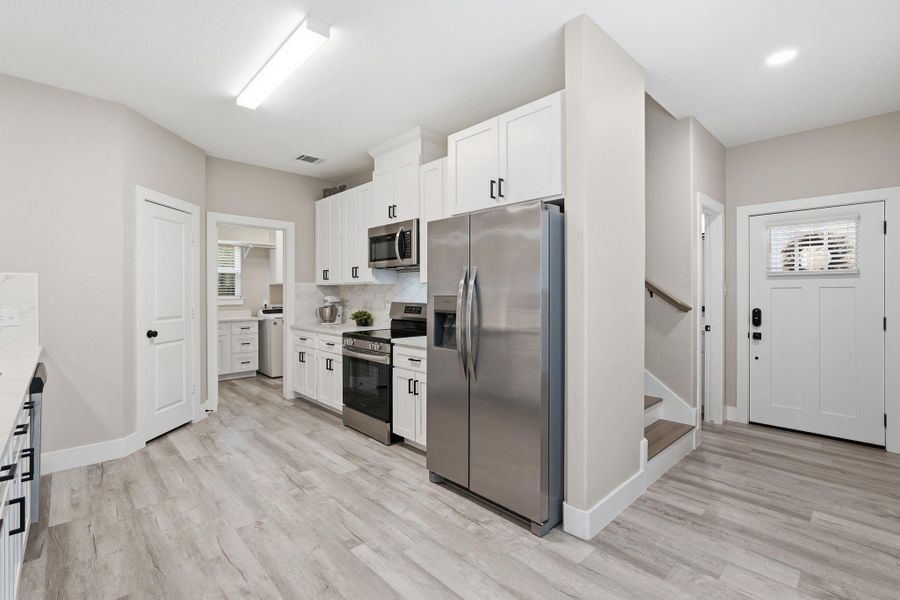 Furnished interior view inside a new home in , Conroe (Image 10).
