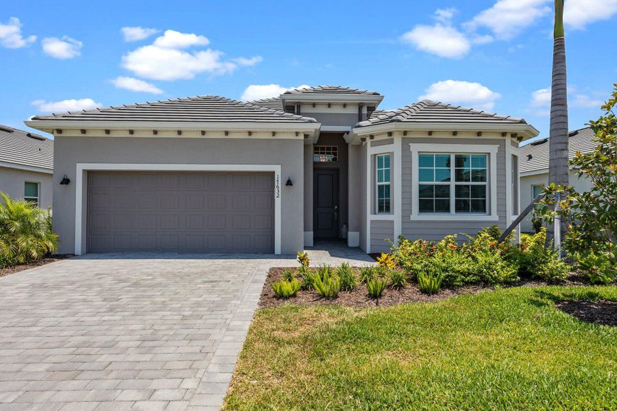Front exterior of a new home in , Venice, FL, highlighting curb appeal (Image 22). Front exterior of a new home in , Venice, FL, highlighting curb appeal (Image 22).
