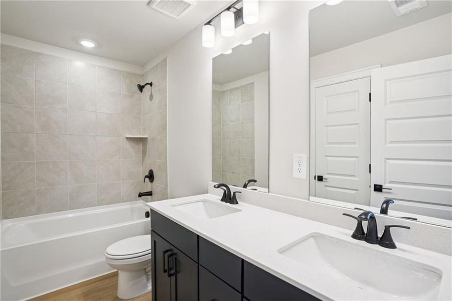 Furnished interior view inside a new home in Hemingway - Highland Series, Cumming (Image 6).