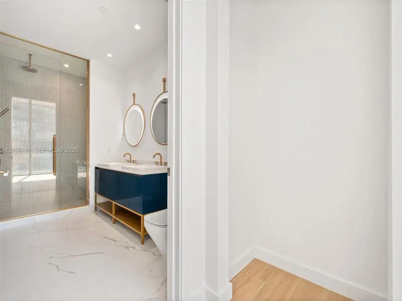 Furnished interior view inside a new home in Mr. C Residences, Miami (Image 9).