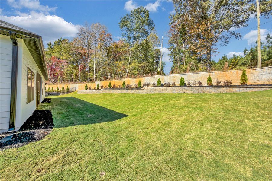Exterior details and patio area of a home in Edwards Ridge, Central (Image 23).