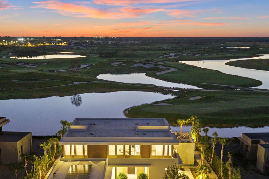 Front exterior of a new home in , Palm Beach Gardens, FL, highlighting curb appeal (Image 2).