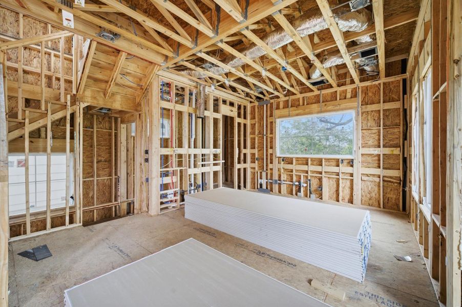 View of kitchen area and walk-in pantry.
