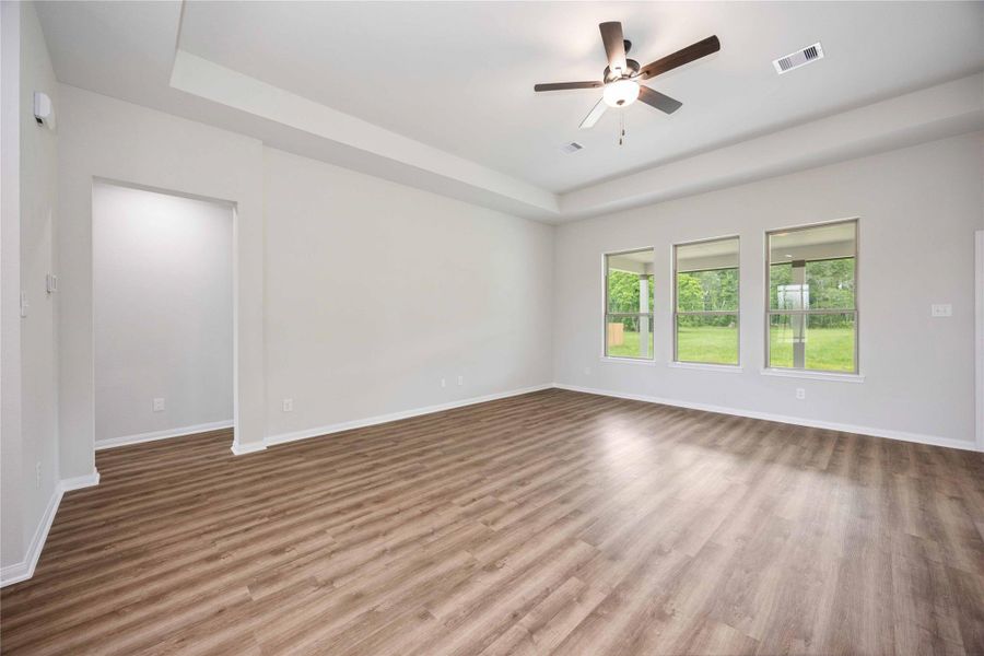 The large family room features large windows offering bright light during the daytime. The large family room features large windows offering bright light during the daytime.