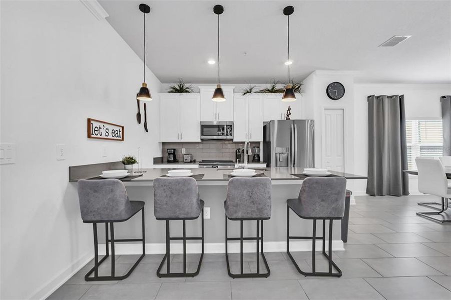 Furnished interior view inside a new home in , Kissimmee (Image 29).