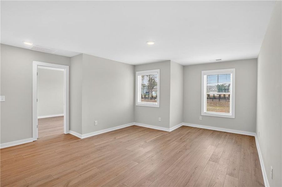 Spacious, unfurnished interior of a new home in The Fairways at Mirror Lake, Villa Rica (Image 16).