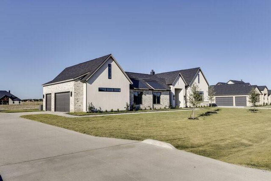 Front exterior of a new home in , Midlothian, TX, highlighting curb appeal (Image 1). Front exterior of a new home in , Midlothian, TX, highlighting curb appeal (Image 1).